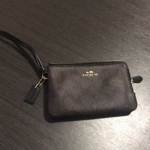 Dark brown Coach wristlet